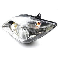 DB Фара основна галоген з лампами, з мотором H7/H7 PY21W W5W лев.Sprinter 06- HELLA 1EB247012011