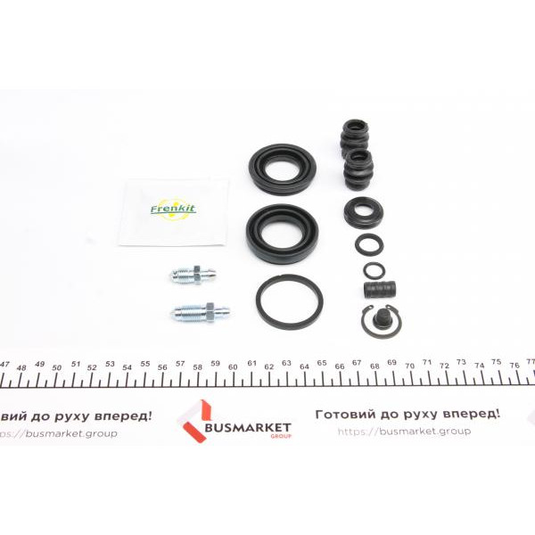 234947 FRENKIT Ремкомплект супорту (заднього) Mazda 6/Nissan Primera 96-08 (d=34mm) (+поршень з механізмом) (Tokic)