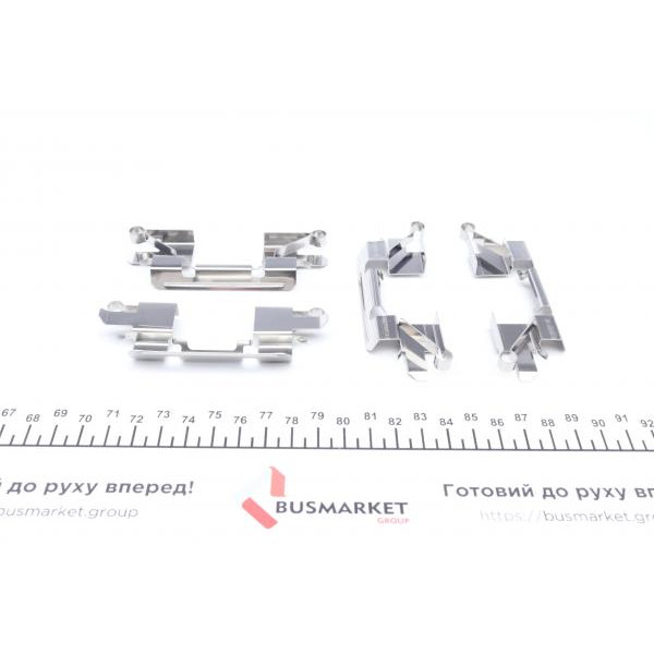 1091769 QUICK BRAKE Планка супорта (переднього) притискна (к-кт) Mitsubishi L200 05-/Nissan Leaf 10- (Tokico)